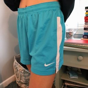 Bright blue nike shorts.